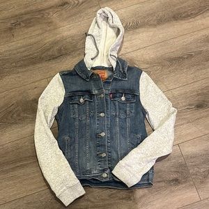 Denim button up jacket with grey hoodie and sleeves
